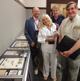 Boston ANA attendees examining my Massachusetts Bay Colony coin display