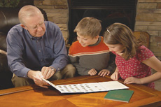 [photo: People of all ages and from all walks of life enjoy the hobby of collecting coins]