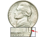 The D mint mark on a 1950 Nickel signifies a scarce, low-mintage coin.